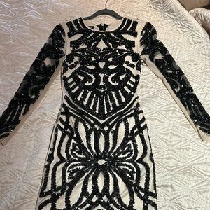 Bebe sequin black and ivory mini dress.